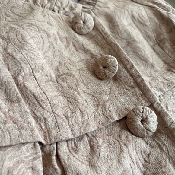 Forever Collectibles Tan Trench Coat with Textured Floral Design - Picture 2 of 15